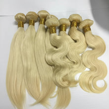 Load image into Gallery viewer, blonde hair extensions with gold ties on a white background, 
